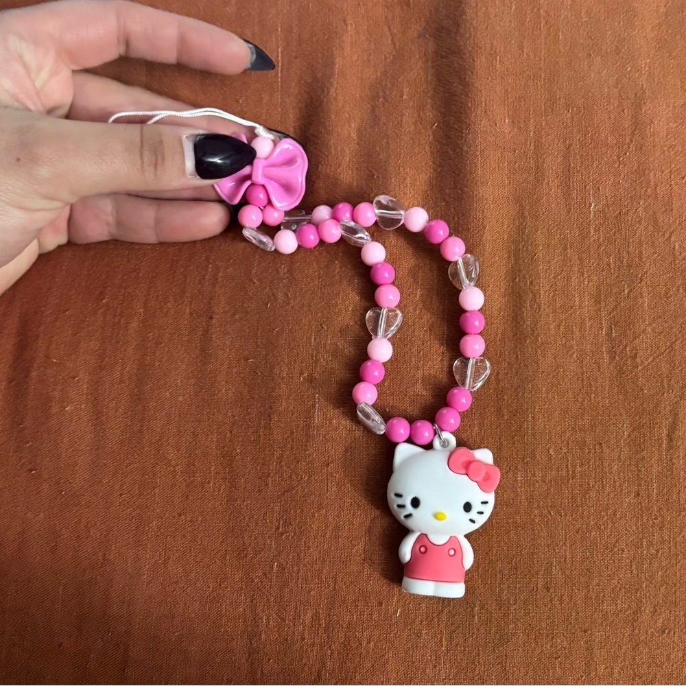 NWT Sanrio Hello Kitty Bow Phone Wristlet Pink - Picture 7 of 9